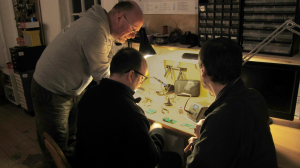members of ipswich makerspace soldering
